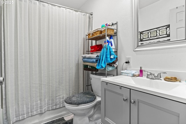 185 N Seneca Rd, Eugene, OR 97402 - full bath with vanity, a textured wall, and shower / bath combo with shower curtain