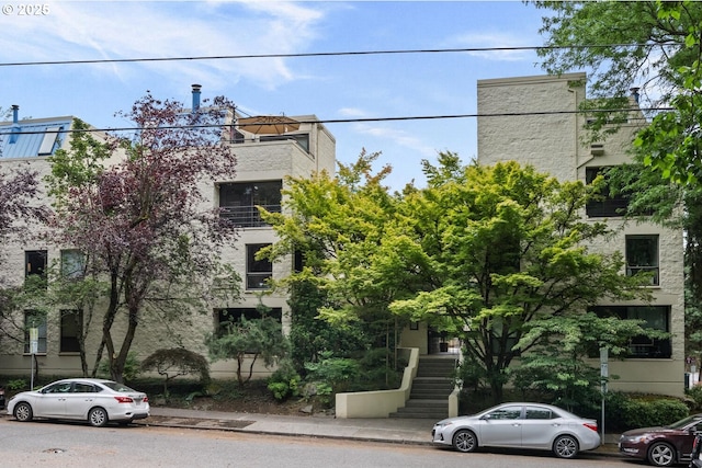 1919 NW Hoyt St Unit 104, Portland, OR 97209 - view of apartment building / complex featuring stairway