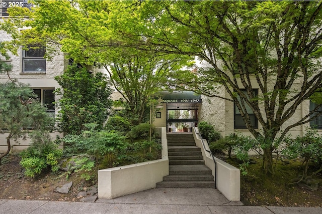 1919 NW Hoyt St Unit 104, Portland, OR 97209 - view of front of house with stairway and stucco siding