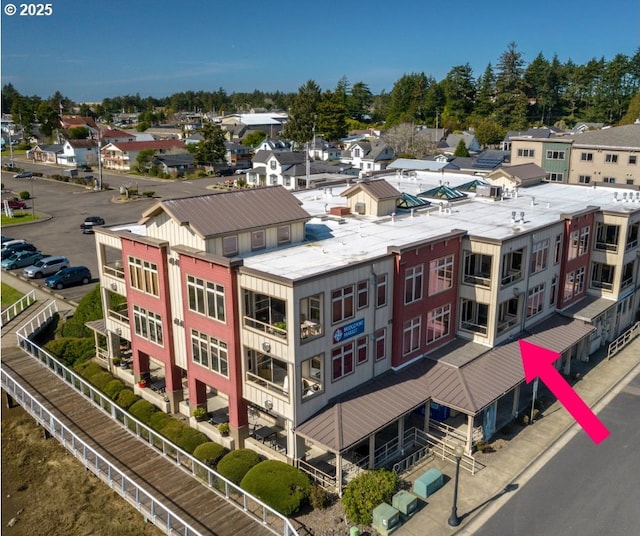 drone / aerial view with a residential view