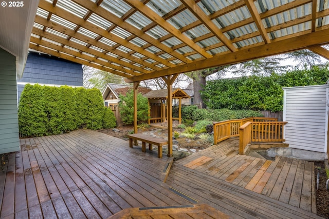 wooden deck with fence and a pergola