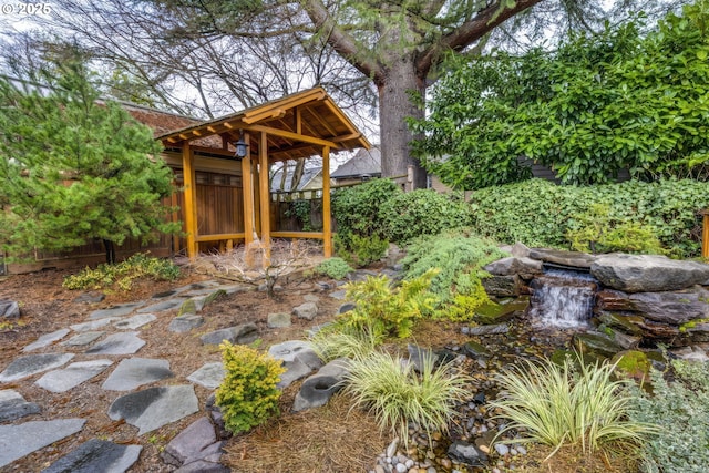 view of yard featuring fence