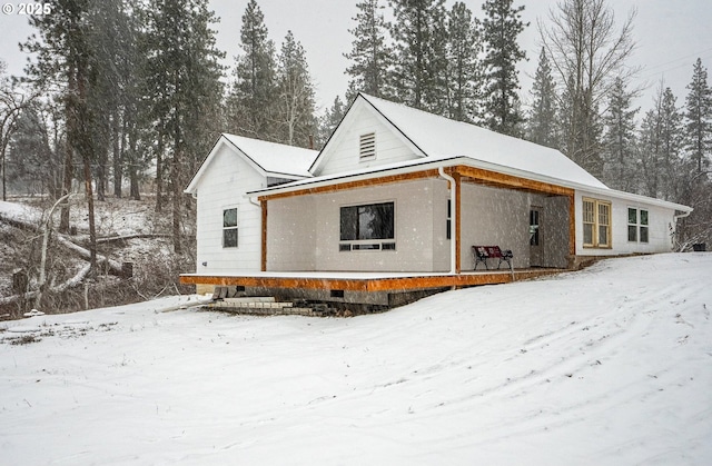 view of snow covered property