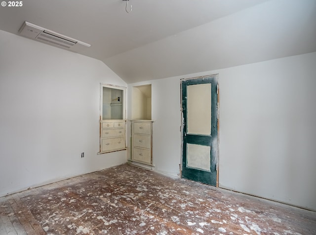 unfurnished bedroom featuring vaulted ceiling