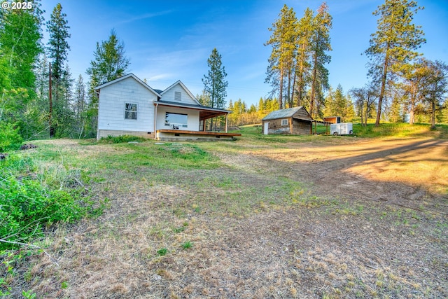 932 Zelinski Rd, Goldendale, WA 98620 - back of property featuring a storage unit and an outbuilding