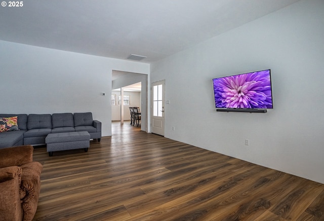 living room featuring dark hardwood / wood-style floors