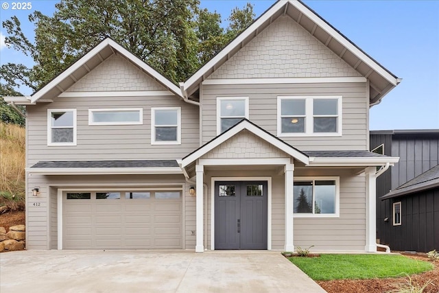 craftsman house featuring a garage