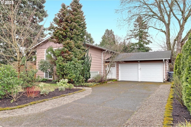 split level home featuring a garage