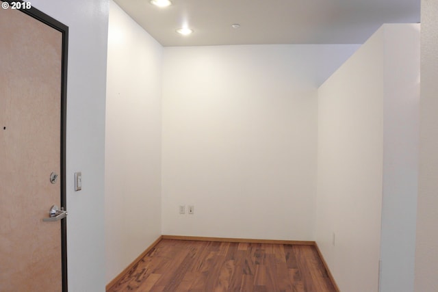 1125 NW 9th Ave, Portland, OR 97209 - unfurnished room with wood finished floors and recessed lighting