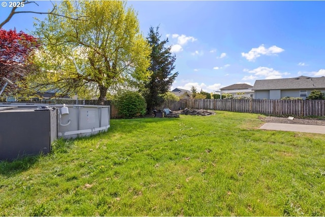 view of yard featuring a fenced backyard