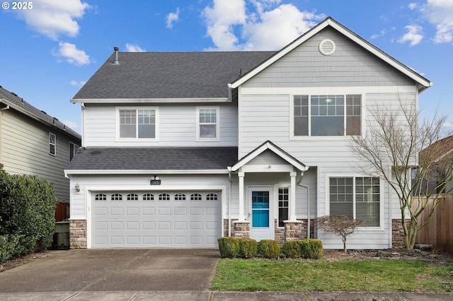 view of front of home with concrete driveway, a garage, stone siding, and a shingled roof