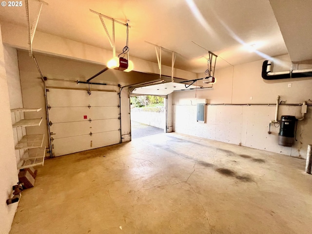 garage with electric panel and a garage door opener