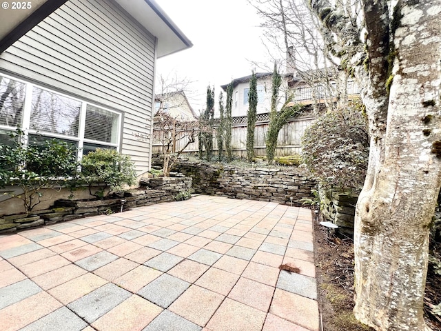 view of patio / terrace with fence