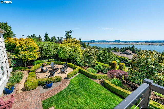 6413 Buena Vista Dr, Vancouver, WA 98661 - view of green lawn featuring a water view and a patio area