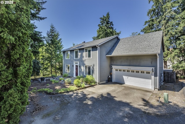 9373 SW Fast Pl, Portland, OR 97223 - colonial house with a garage, driveway, and roof with shingles