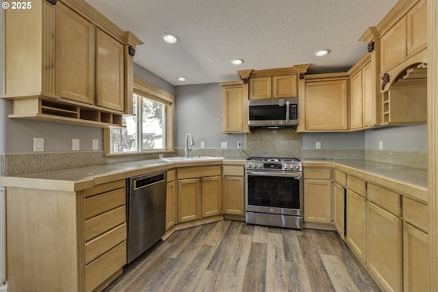 9373 SW Fast Pl, Portland, OR 97223 - kitchen with stainless steel appliances, open shelves, dark wood-type flooring, recessed lighting, and light brown cabinetry