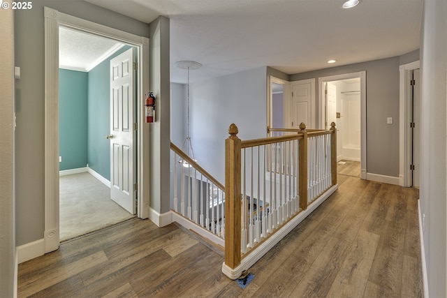 9373 SW Fast Pl, Portland, OR 97223 - corridor with an upstairs landing, wood finished floors, and recessed lighting