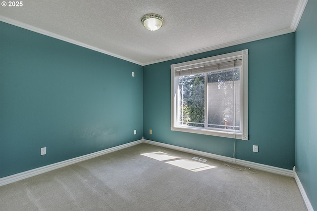 9373 SW Fast Pl, Portland, OR 97223 - unfurnished room with a textured ceiling, ornamental molding, and carpet flooring