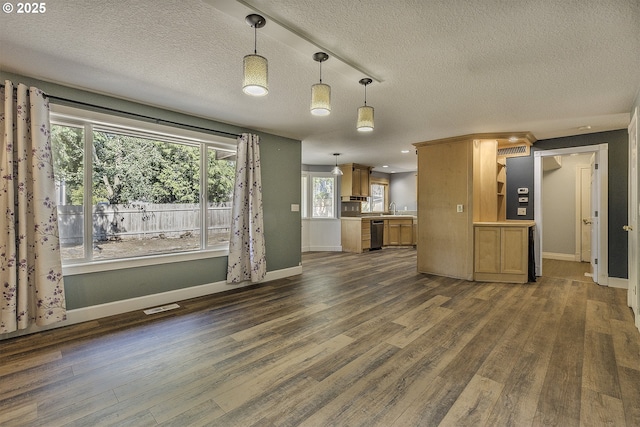 9373 SW Fast Pl, Portland, OR 97223 - unfurnished living room with dark wood-type flooring and a textured ceiling