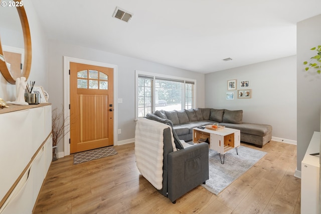 2822 NE Fremont Dr, Portland, OR 97220 - living room featuring light wood-type flooring and baseboards