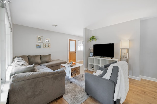 2822 NE Fremont Dr, Portland, OR 97220 - living room with light wood-style floors and baseboards