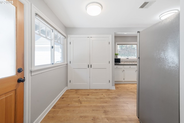 2822 NE Fremont Dr, Portland, OR 97220 - hall with light wood finished floors