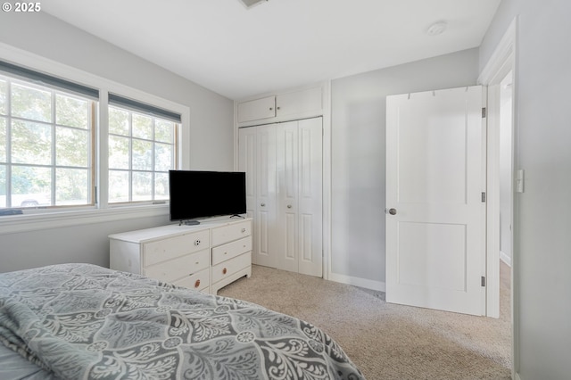 2822 NE Fremont Dr, Portland, OR 97220 - bedroom featuring light colored carpet and a closet