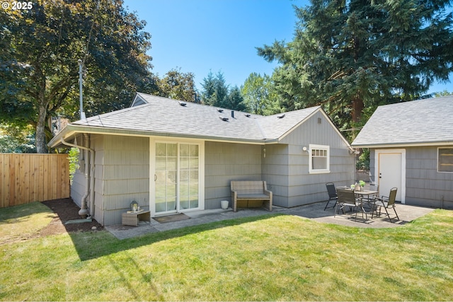 2822 NE Fremont Dr, Portland, OR 97220 - rear view of property featuring a patio and a shingled roof