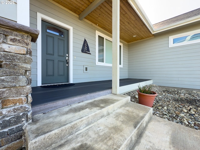 entrance to property with a porch