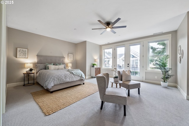 carpeted bedroom with baseboards, french doors, and access to exterior