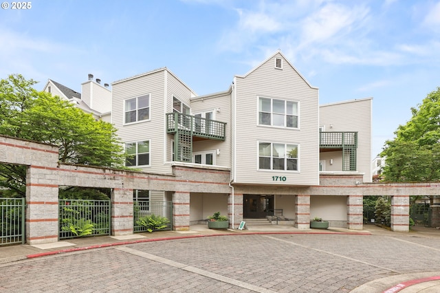 1710 S Harbor Way Unit 201, Portland, OR 97201 - view of building exterior featuring uncovered parking
