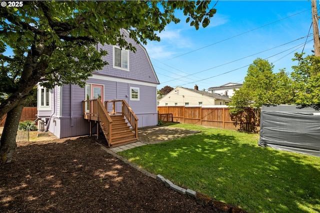 4536 N Haight Ave, Portland, OR 97217 - rear view of property with a lawn and fence