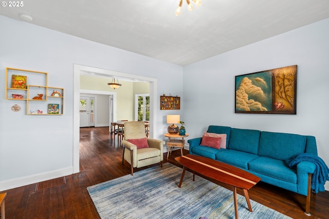 4536 N Haight Ave, Portland, OR 97217 - living room featuring baseboards and hardwood / wood-style floors