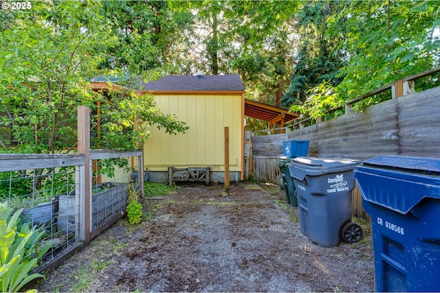 1327 Grant St, Eugene, OR 97402 - view of patio with an outbuilding