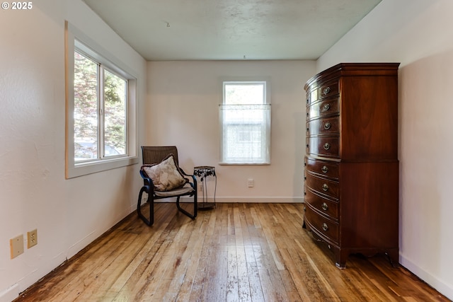 1327 Grant St, Eugene, OR 97402 - sitting room with light wood-style floors, healthy amount of natural light, and baseboards