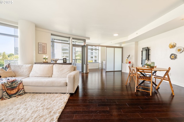 3601 S River Pkwy Unit 800, Portland, OR 97239 - living area with wood finished floors, plenty of natural light, recessed lighting, and floor to ceiling windows
