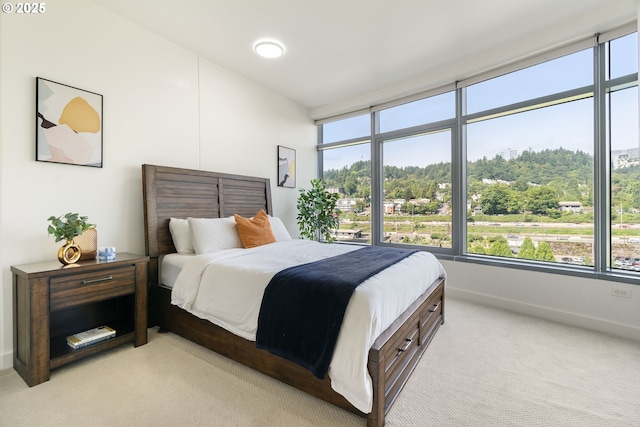 3601 S River Pkwy Unit 800, Portland, OR 97239 - bedroom with light colored carpet and baseboards
