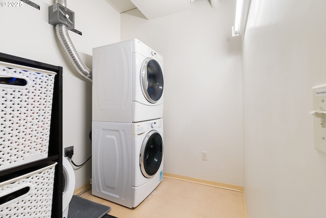 3601 S River Pkwy Unit 800, Portland, OR 97239 - washroom with stacked washer / drying machine