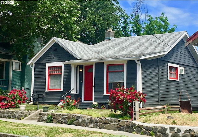 312 NW 7th St, Pendleton, OR 97801 - bungalow with entry steps, a chimney, and roof with shingles