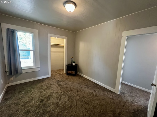 312 NW 7th St, Pendleton, OR 97801 - unfurnished bedroom featuring carpet, a closet, and a spacious closet