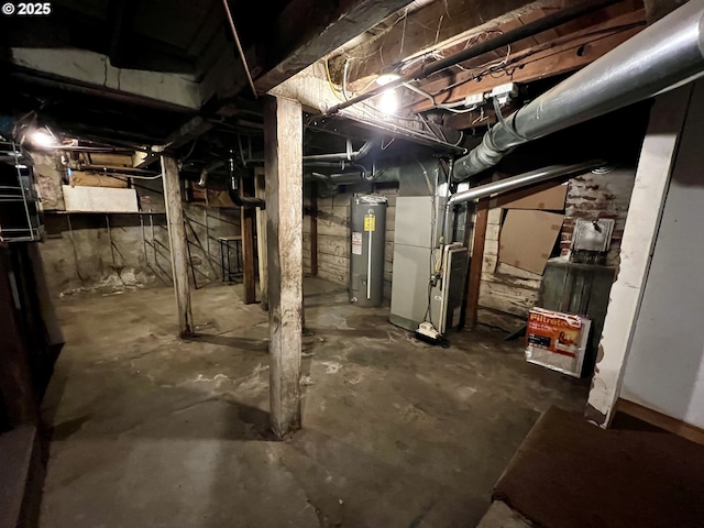 312 NW 7th St, Pendleton, OR 97801 - unfinished below grade area with electric water heater and heating unit