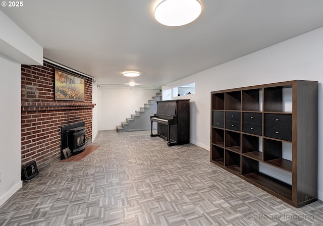 5730 N Harvard St, Portland, OR 97203 - unfurnished living room featuring stairway, a wood stove, and baseboards
