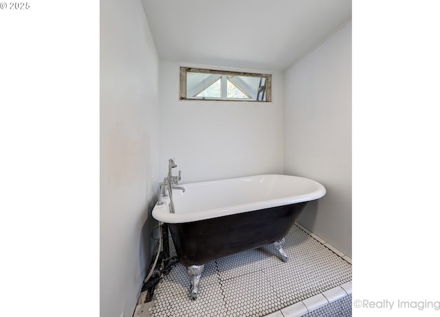 5730 N Harvard St, Portland, OR 97203 - full bath featuring a soaking tub and baseboards