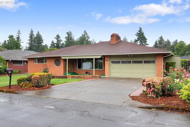 1311 NE 116th Ave, Portland, OR 97220 - ranch-style home featuring brick siding, a chimney, driveway, and a garage