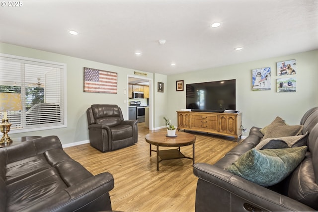 311 S 68th Pl, Springfield, OR 97478 - living area featuring light wood-style flooring and recessed lighting