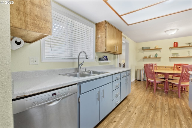 311 S 68th Pl, Springfield, OR 97478 - kitchen featuring dishwasher, light wood-type flooring, light countertops, and open shelves