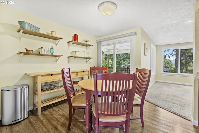 311 S 68th Pl, Springfield, OR 97478 - dining space with plenty of natural light, wood finished floors, and a textured ceiling