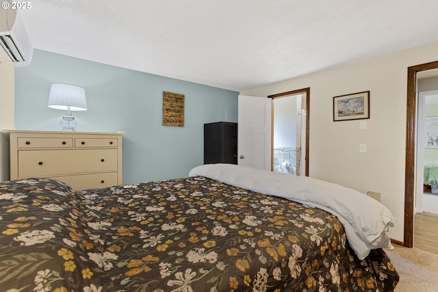 311 S 68th Pl, Springfield, OR 97478 - bedroom featuring an AC wall unit and light colored carpet