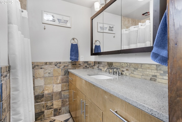 311 S 68th Pl, Springfield, OR 97478 - bathroom with vanity, a shower with curtain, and decorative backsplash