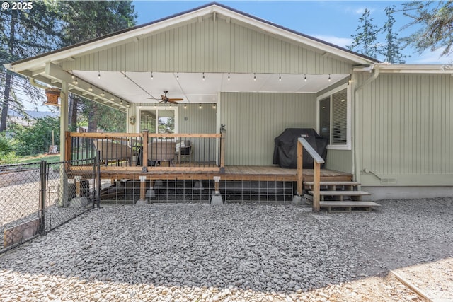 311 S 68th Pl, Springfield, OR 97478 - rear view of house with ceiling fan and a deck